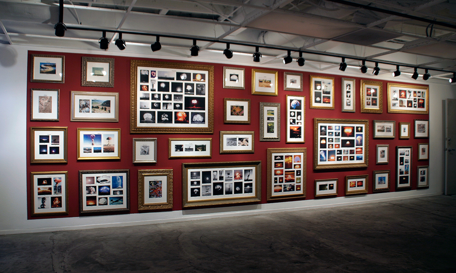 <br/>Family Photos, 2007<br/>88" x 300" (variable size)<br/>laser jet on paper with lettering and frames